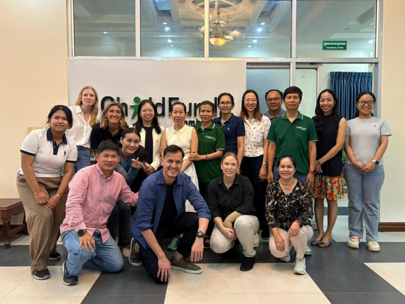 It takes all of us to create change for children. Boramey with colleagues from ChildFund Australia and ChildFund Cambodia, united by a shared commitment.