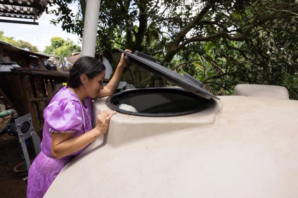 María’s mum, Dolores (pictured above) says that before the installation of a rainwater harvesting system her family and neighbours would spend hours fetching water – water that wasn't even guaranteed to be safe to drink.