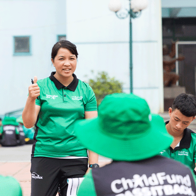 Huyen coaching at the ChildFund Pass it Back program.
