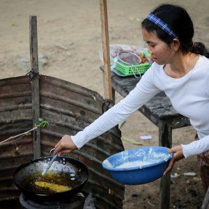 Sameoun helps her mother sell fried banana in her spare time.