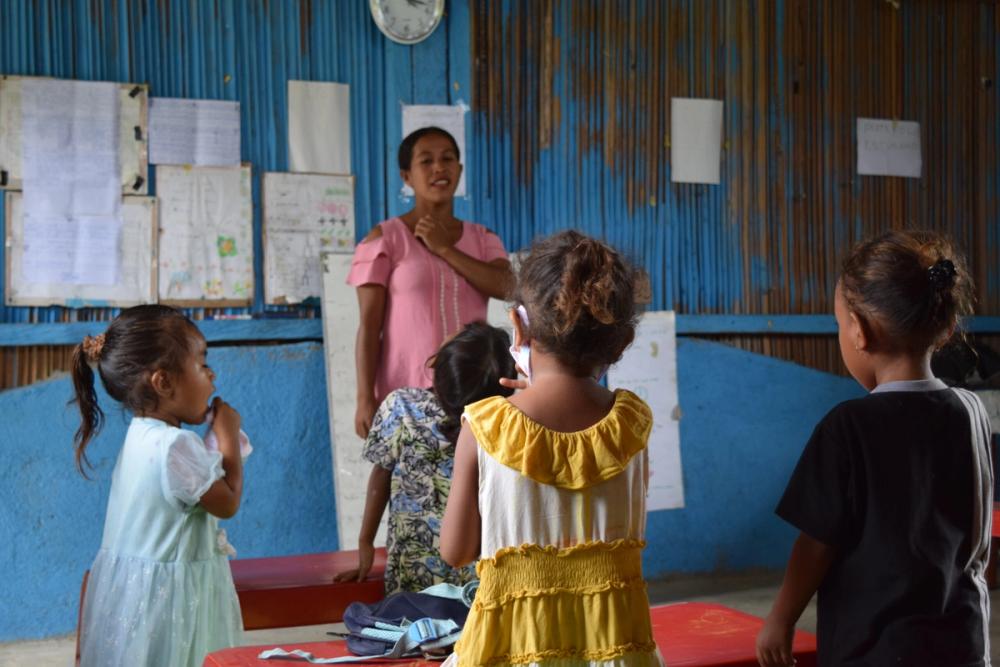 Preschool teacher Agostinha takes her students through their lessons in Liquiça, Timor-Leste.