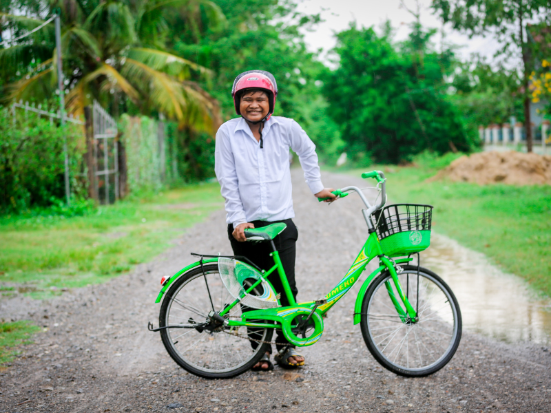 A bicycle can help a child get to school, while a helmet helps make the journey safer.