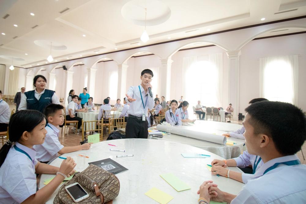 Pypo takes the mic to share his thoughts and experiences about online safety at the National Children's Forum in Laos. 