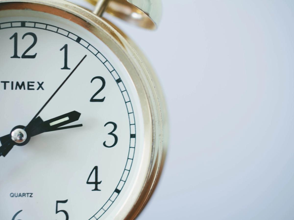 Close-up of a clock, is Agile teh goal of Agile transoframtion or is it getting more value faster or some other higher level outcome?