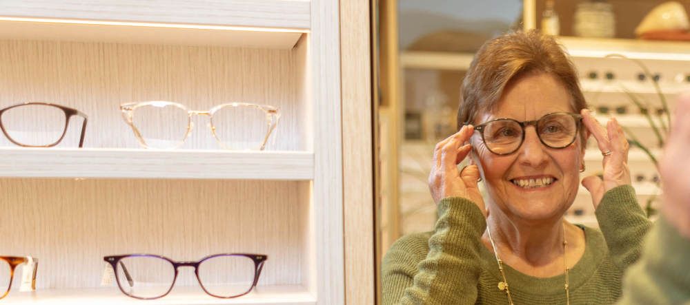 SuperGold - A senior out shopping for spectacles