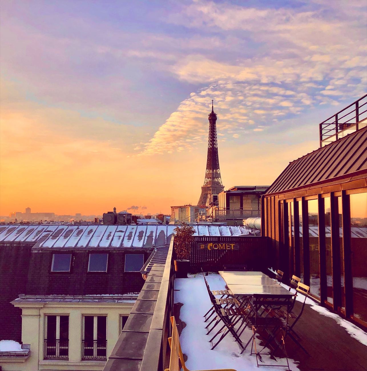 Rooftop at sunset facing the Eiffel Tower