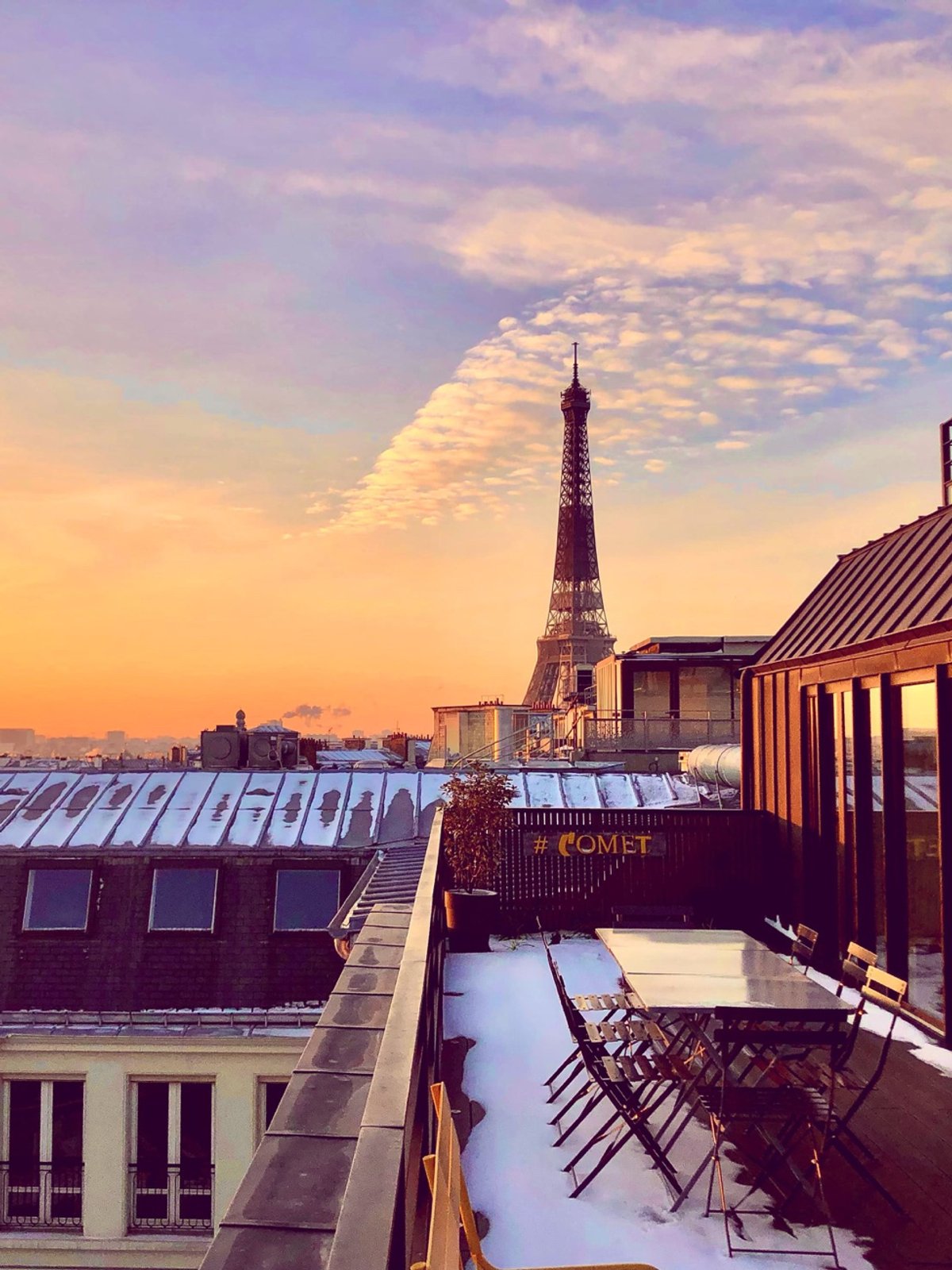 Rooftop at sunset facing the Eiffel Tower