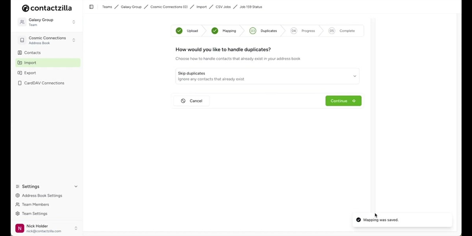 Import complete notification showing all contacts successfully imported into the Cosmic Connections address book