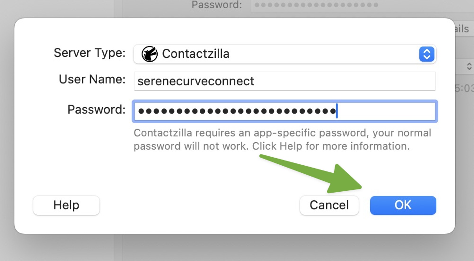 BusyContacts login dialog with the 'Server Type' set to ContactZilla. The 'User Name' field is filled with “serenecurveconnect” and a masked password is entered. A green arrow points to the ‘Cancel’ button, next to the blue ‘OK’ button. A message below the password field notes that an app-specific password is required for ContactZilla.