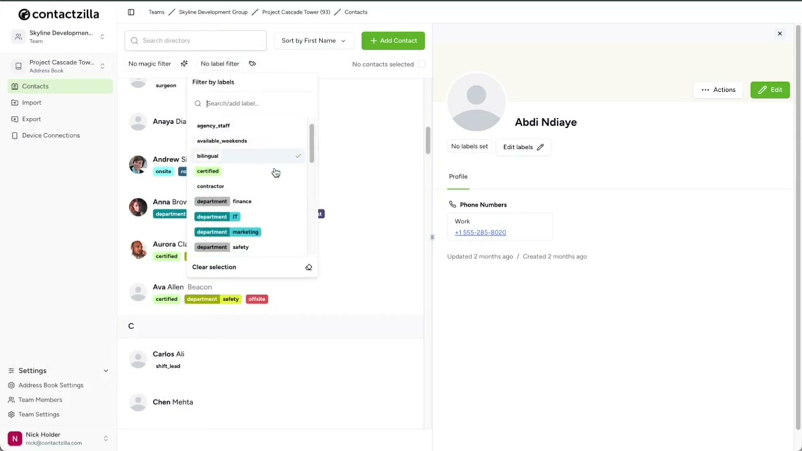 iPhone showing the Contactzilla shared contacts appearing in the native Contacts app with organized lists
