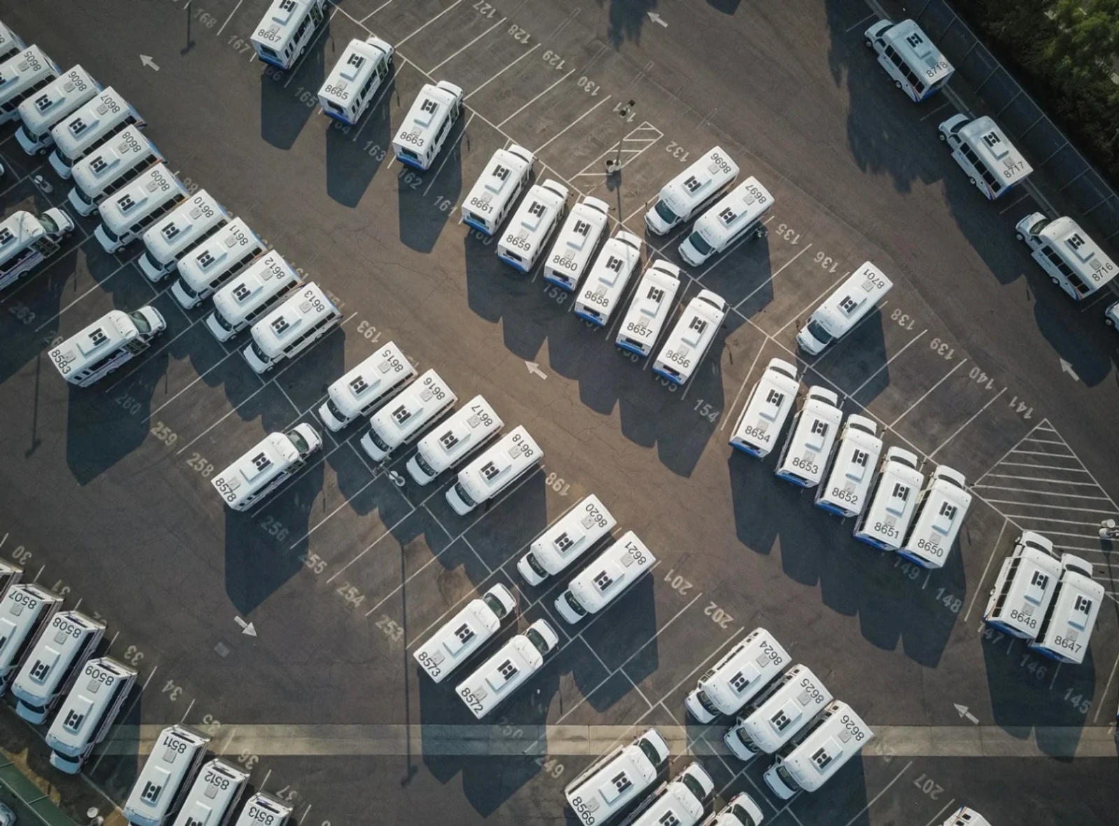 An aerial view of a large fleet of vehicles.