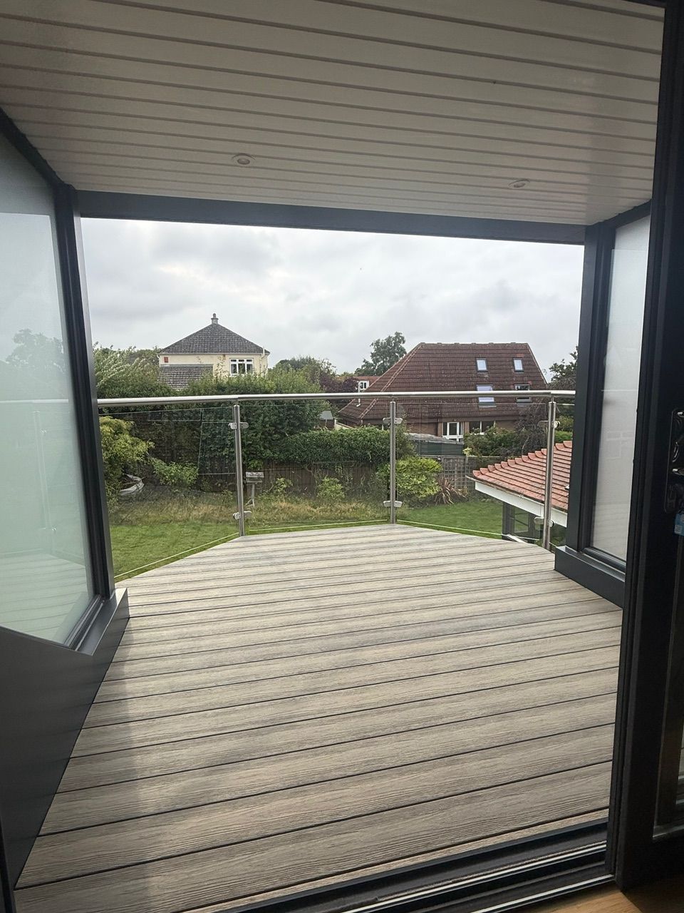View from the patio doors across the balcony towards neighbouring gardens at Fernielaw Avenue