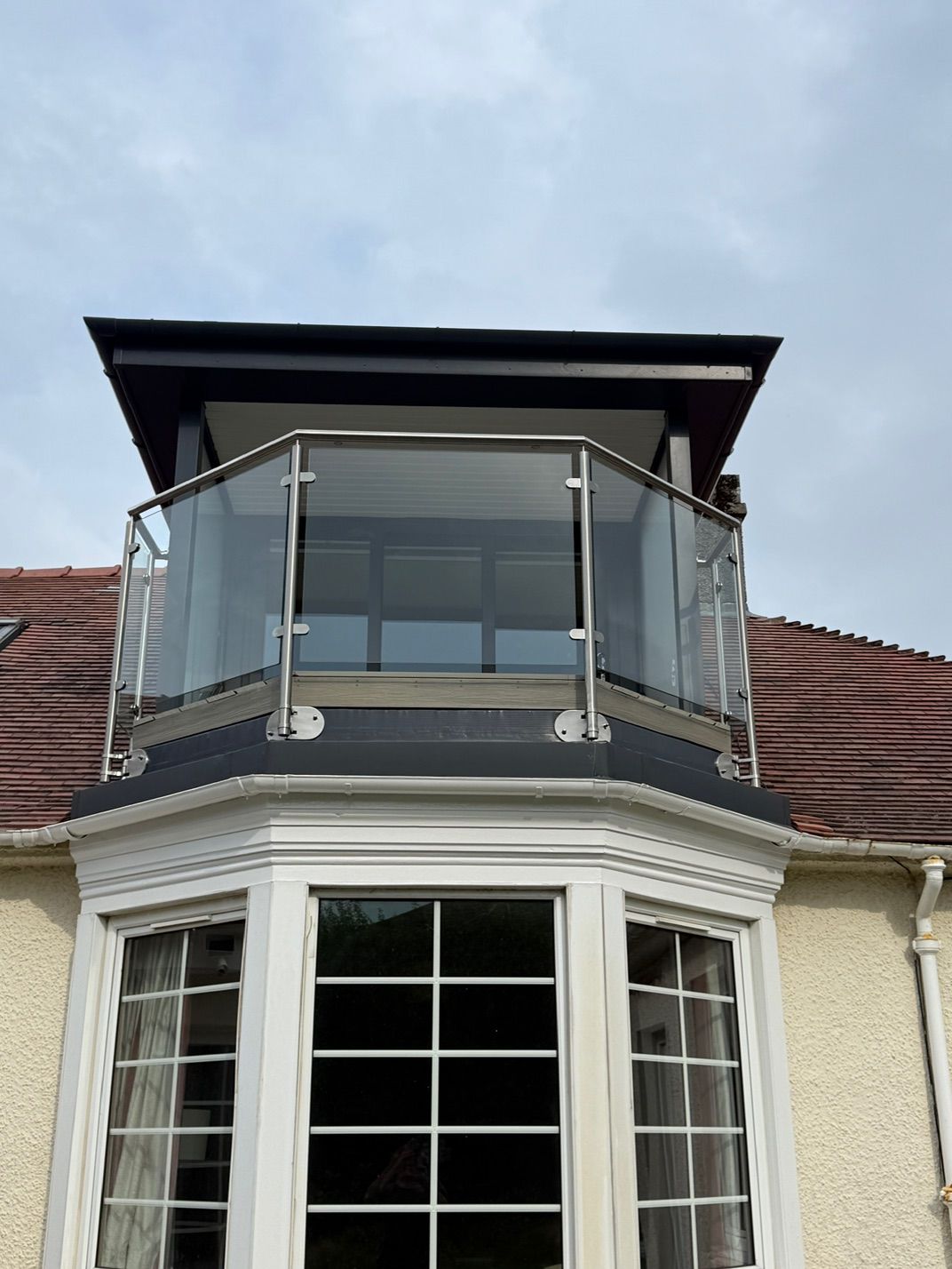 Dormer balcony above the ground-floor bay window at Fernielaw Avenue
