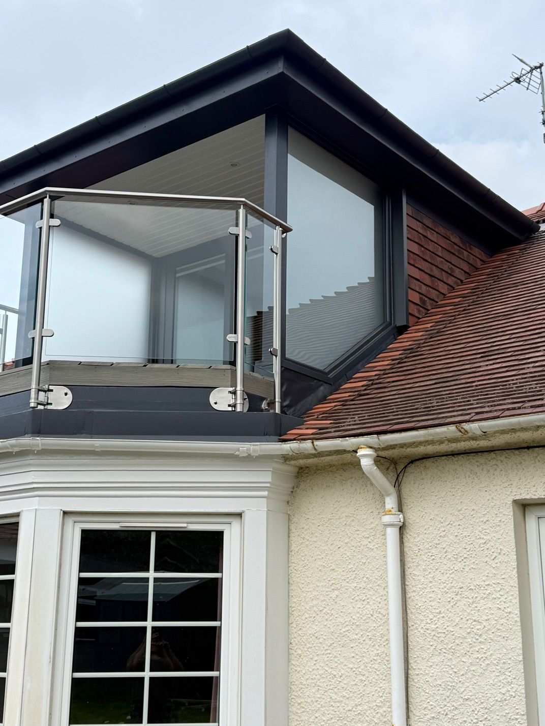 Exterior dormer cladding and glass balcony detail at Fernielaw Avenue