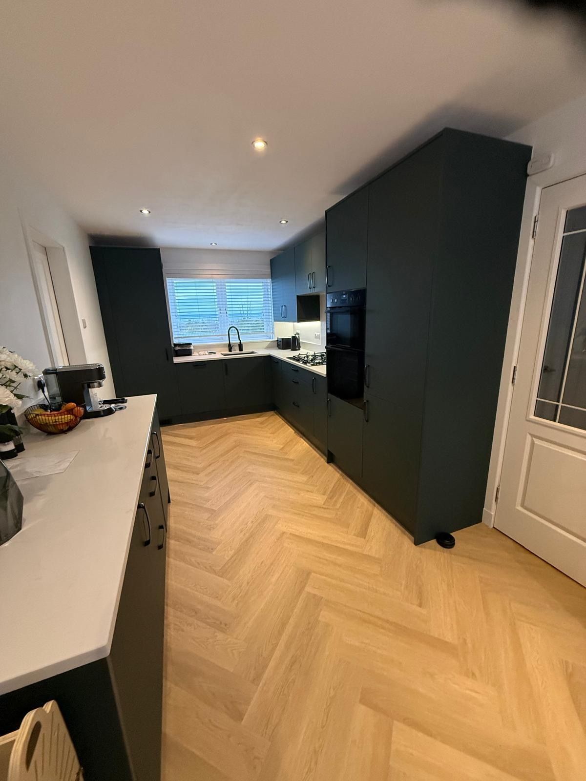 Kitchen island and fitted cabinets in a completed Tranent kitchen refurbishment