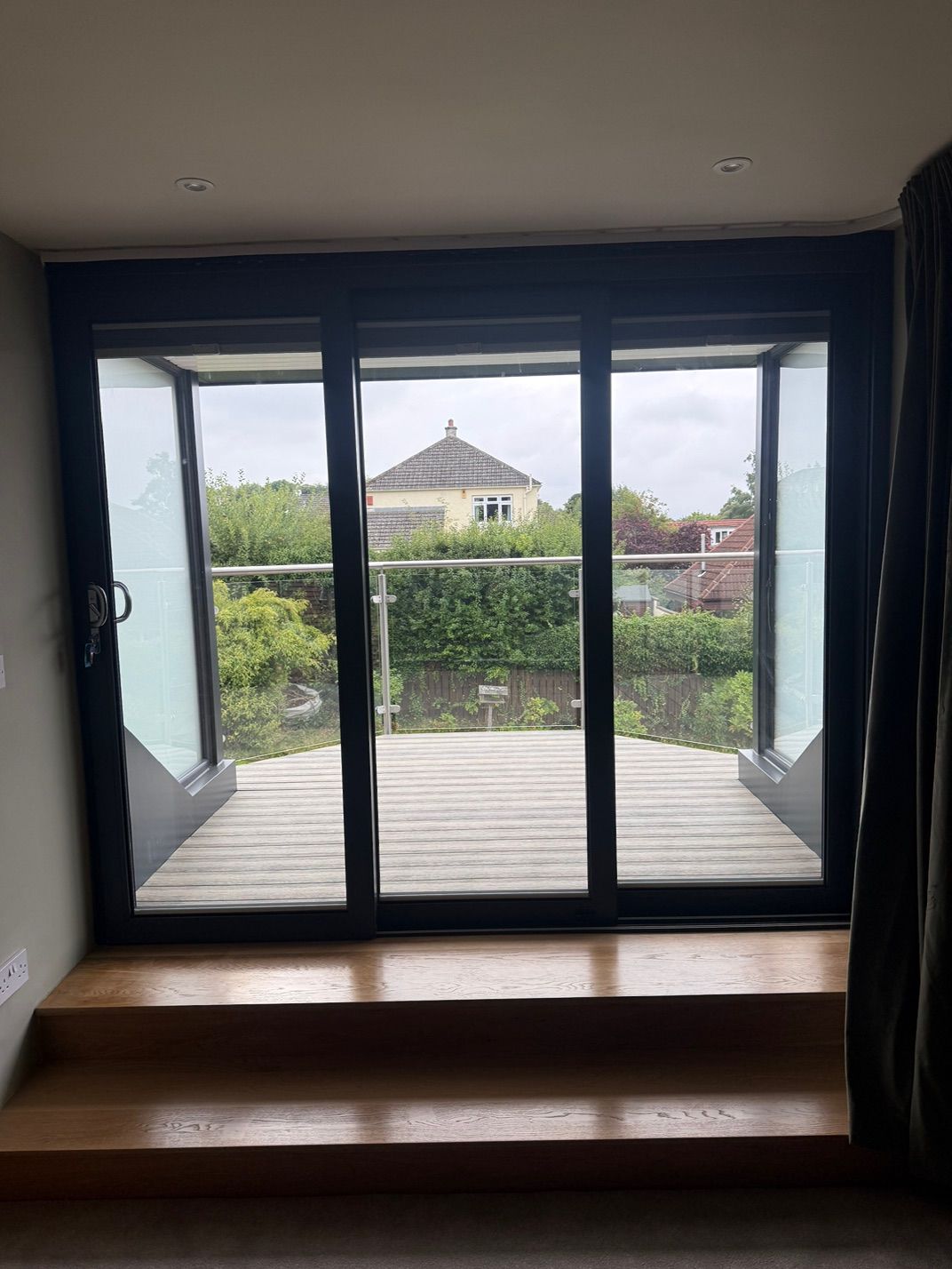 View through the patio doors from the loft room towards the garden at Fernielaw Avenue