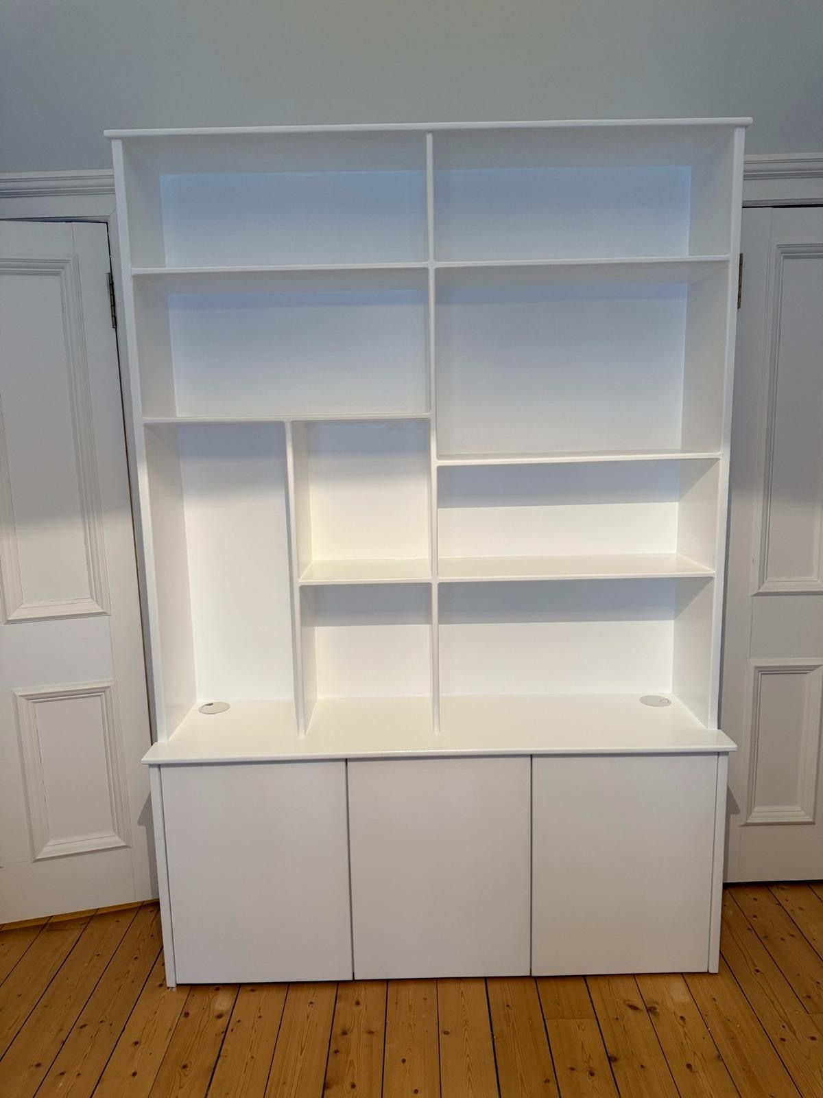 Lower storage doors and open shelving on a custom Comely Bank cabinet