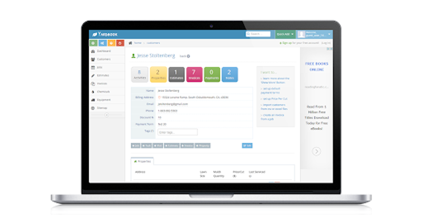 Image of a laptop with Yardbook admin dashboard on the screen