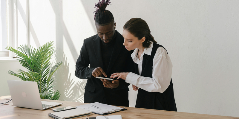 two person checking how to get more bookings online