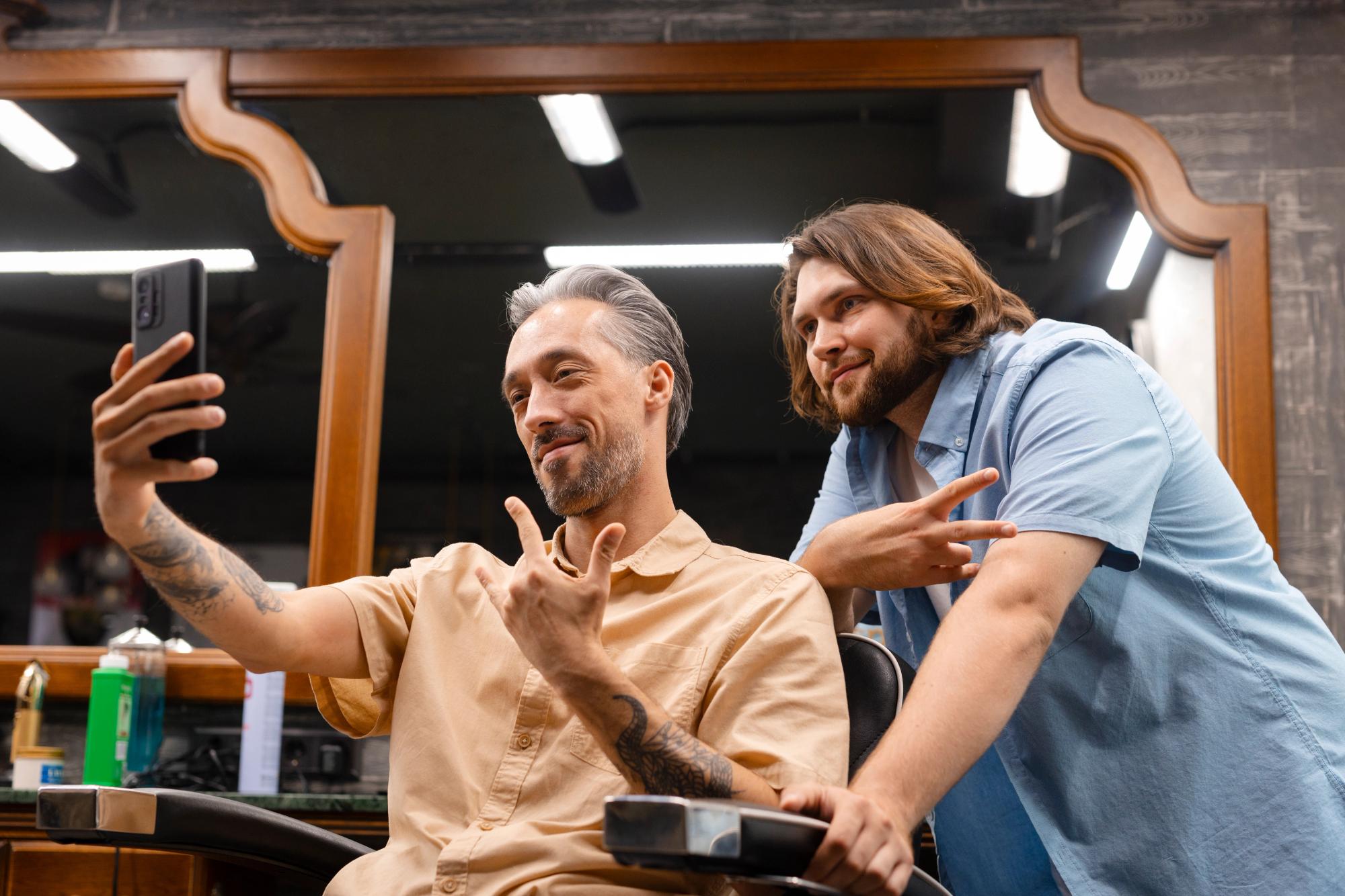 man taking picture on barber chair to make barber advertising
