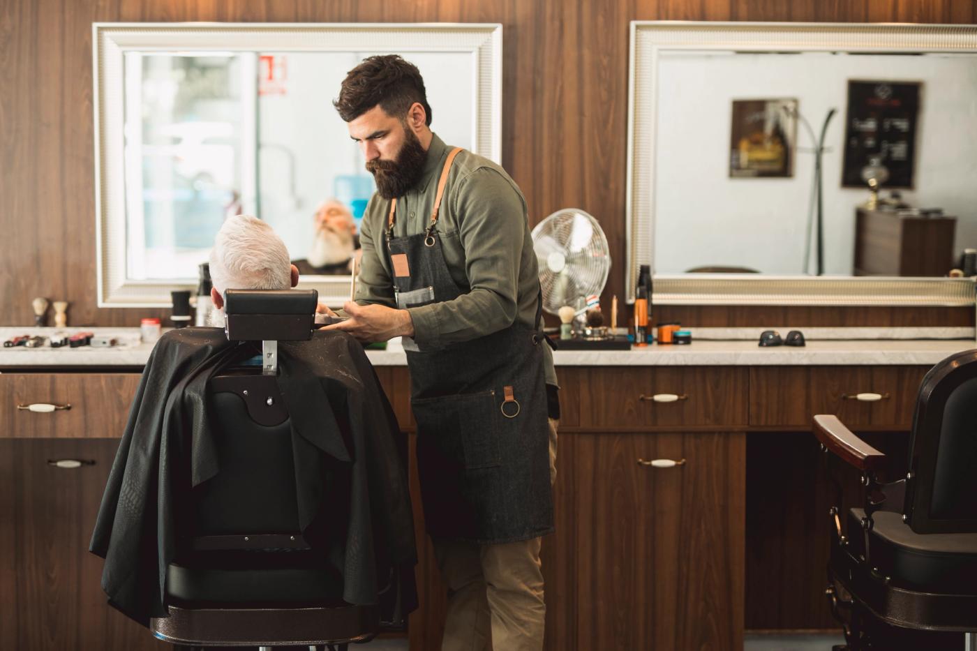 barber working  at solo barbers studio