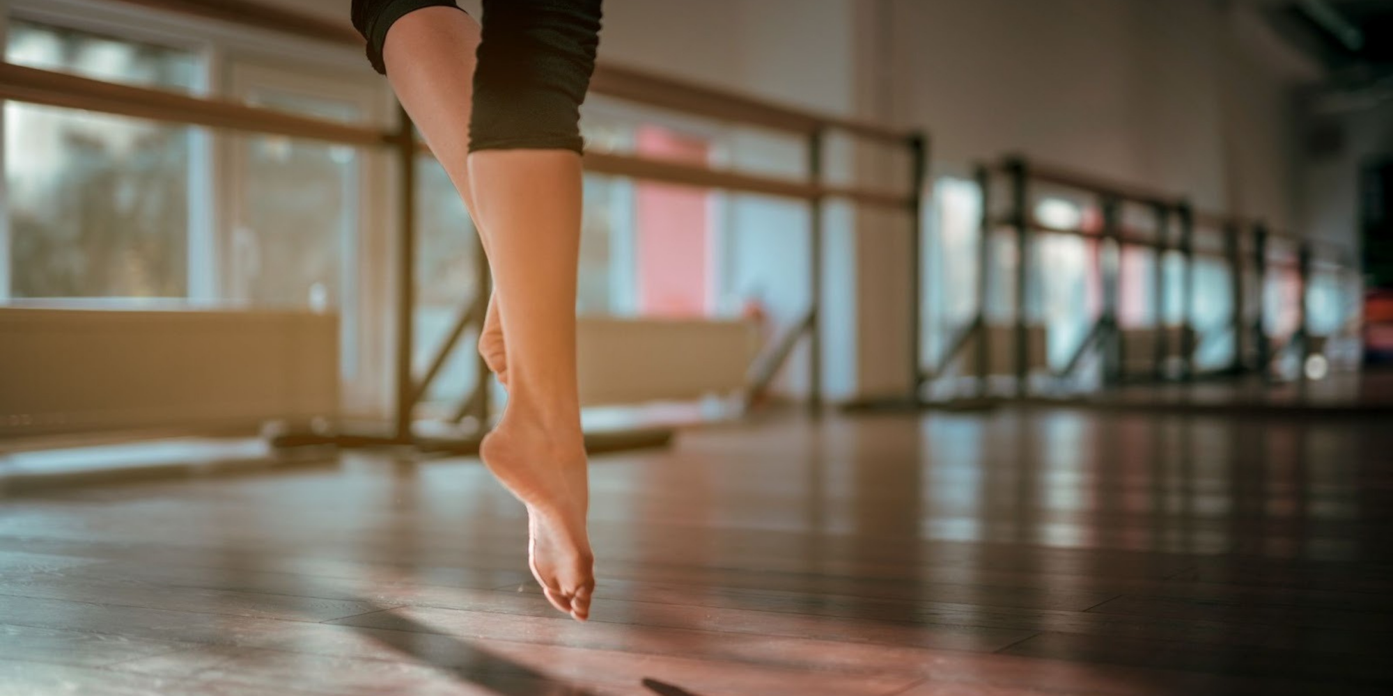 Barefoot dancer with dance studio management software