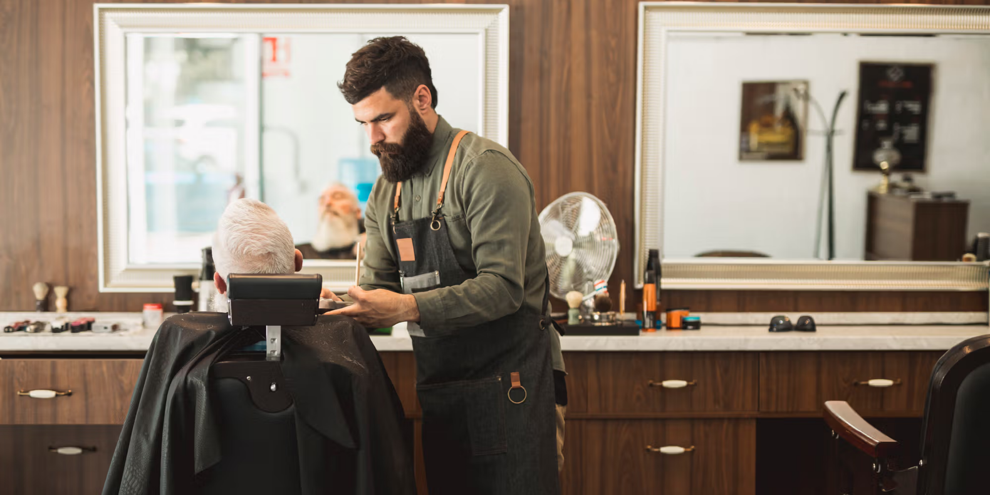 barber working  at solo barbers studio