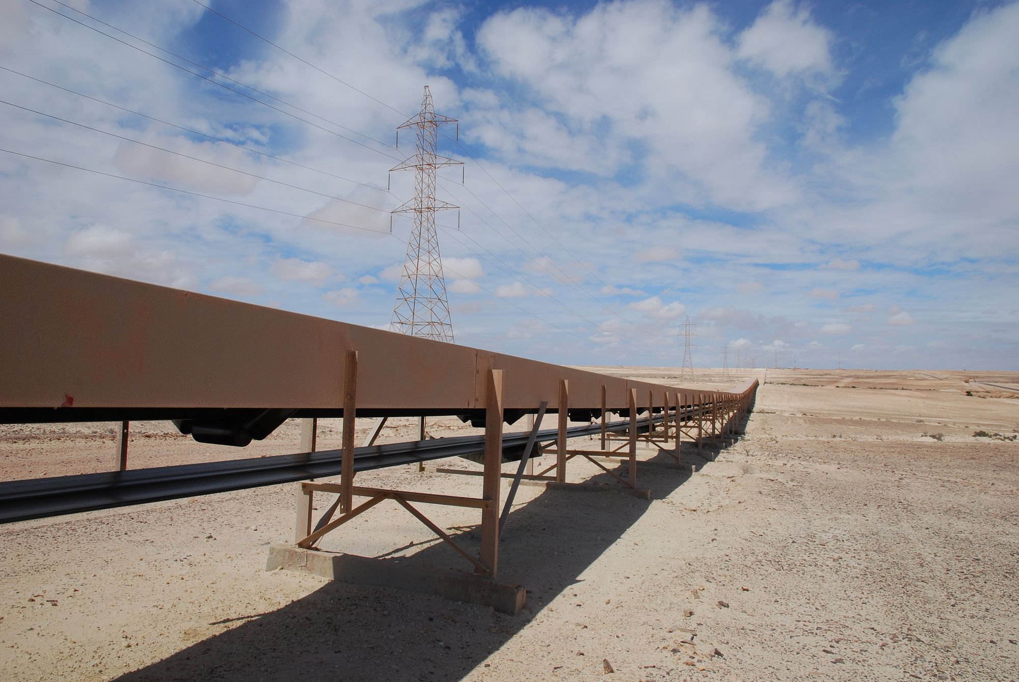 The long conveyor belt carrying phosphate rock across the desert from Bou Craa to Laâyoune