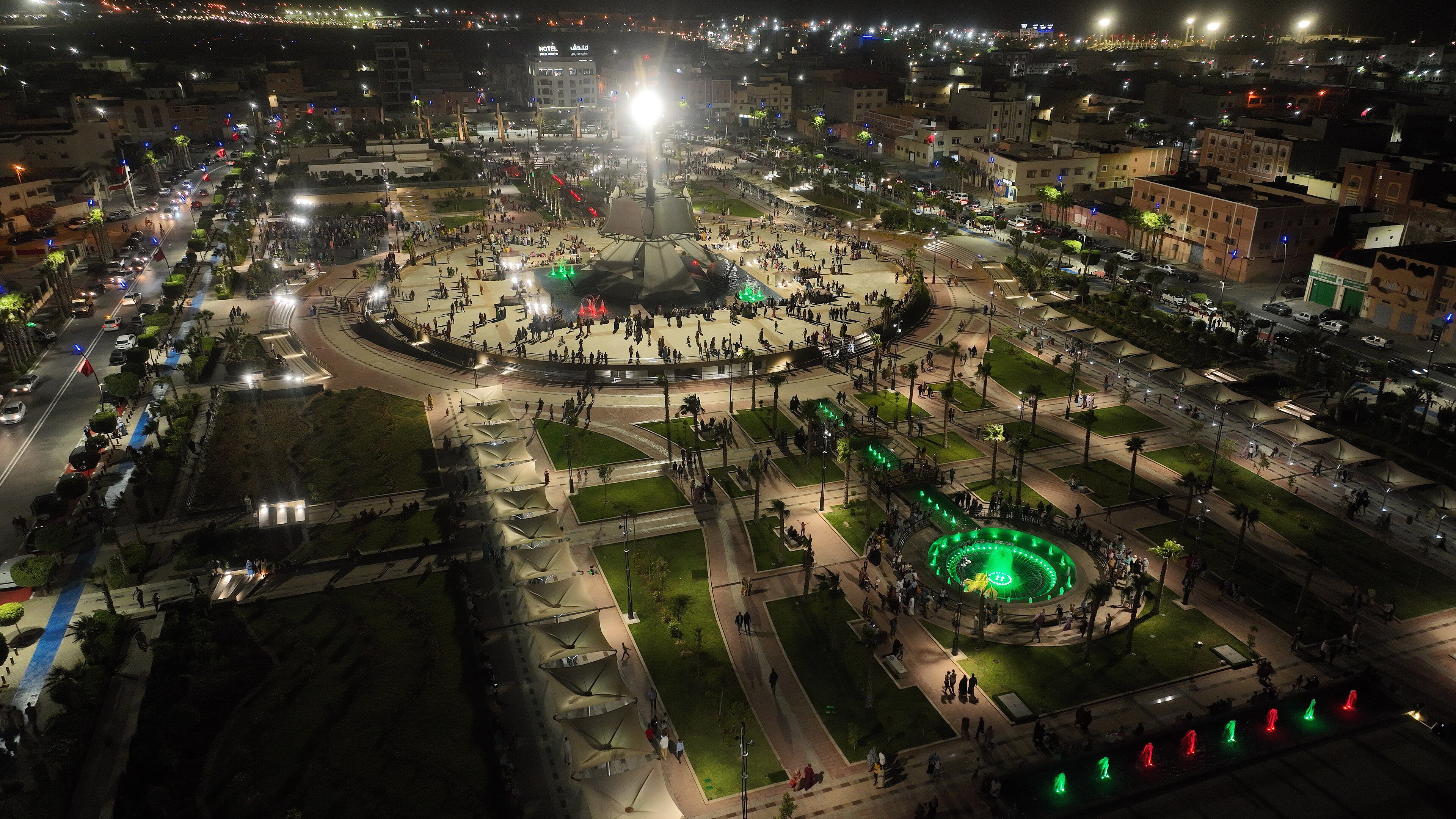 Laâyoune’s central square lit up at night, seen from above