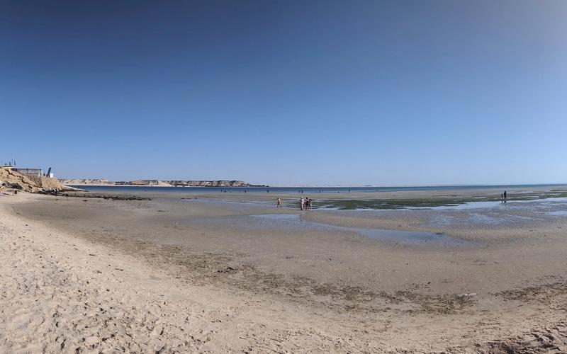 A wide sandy beach on the Dakhla lagoon at low tide