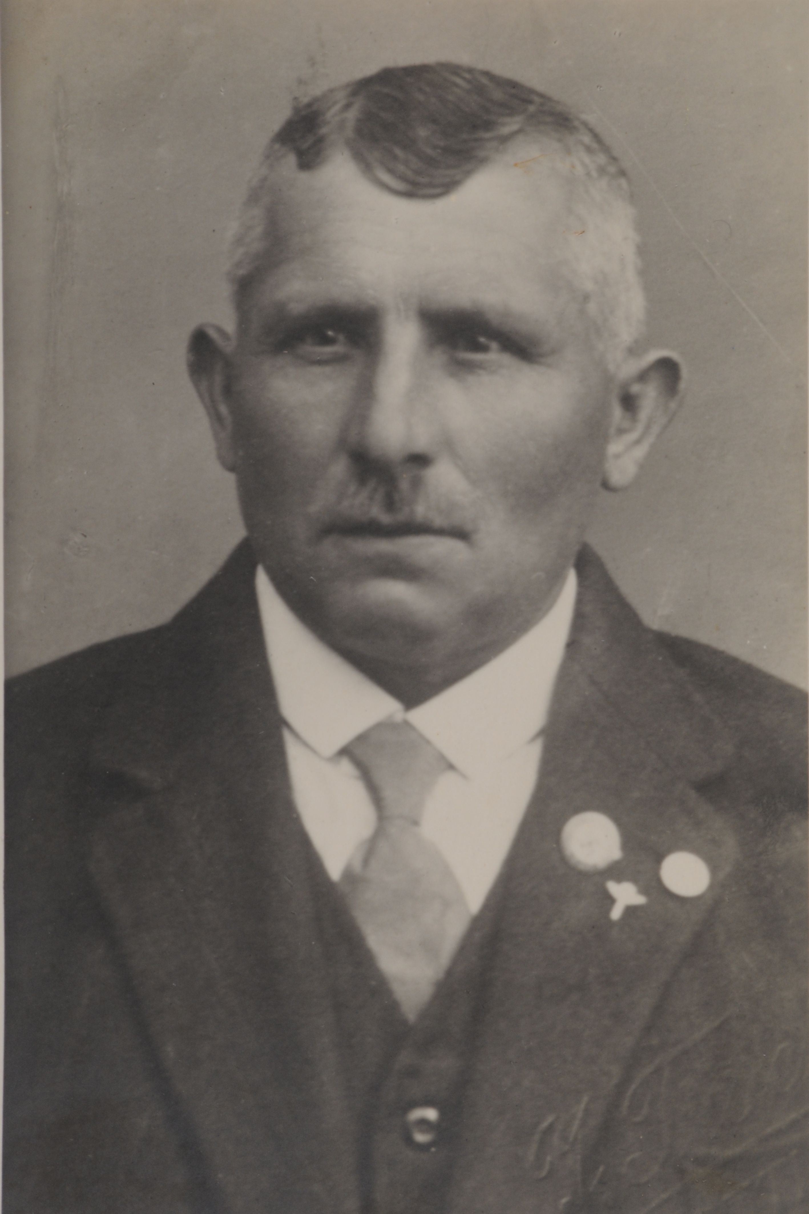 Historisches Porträt von Friedrich Löh, Gründer der Zimmerei