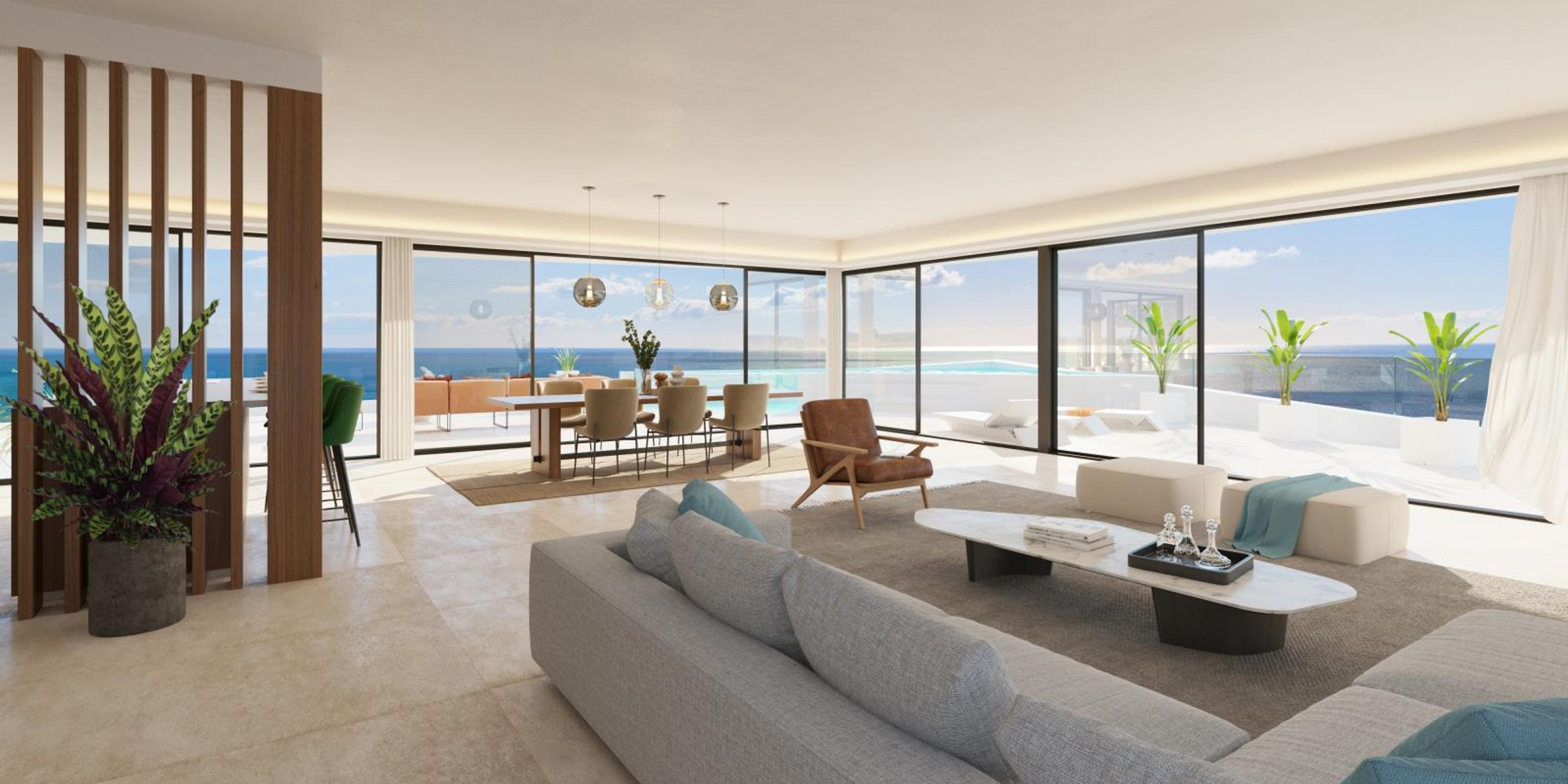 Modernt vardagsrum i lyxlägenhet i Marbella, Costa del Sol, med panoramautsikt över havet. Rymliga interiörer med öppen planlösning, glasväggar och privat terrass med infinitypool. Exklusiva fastigheter i Spanien, perfekt för investering och lyxig livsstil.
