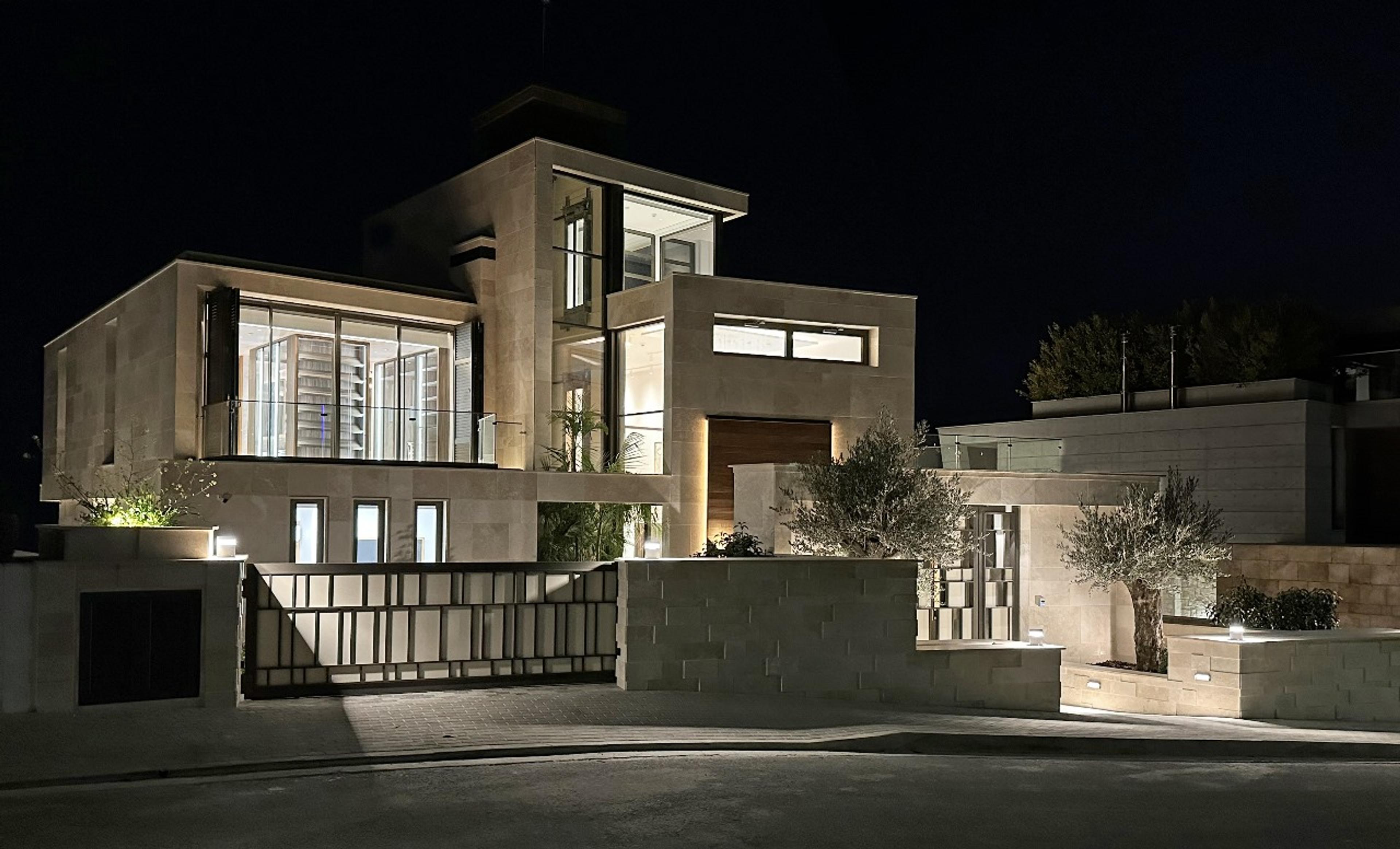 Illuminated villa for sale in Cyprus at night – modern premium property in Limassol 2025