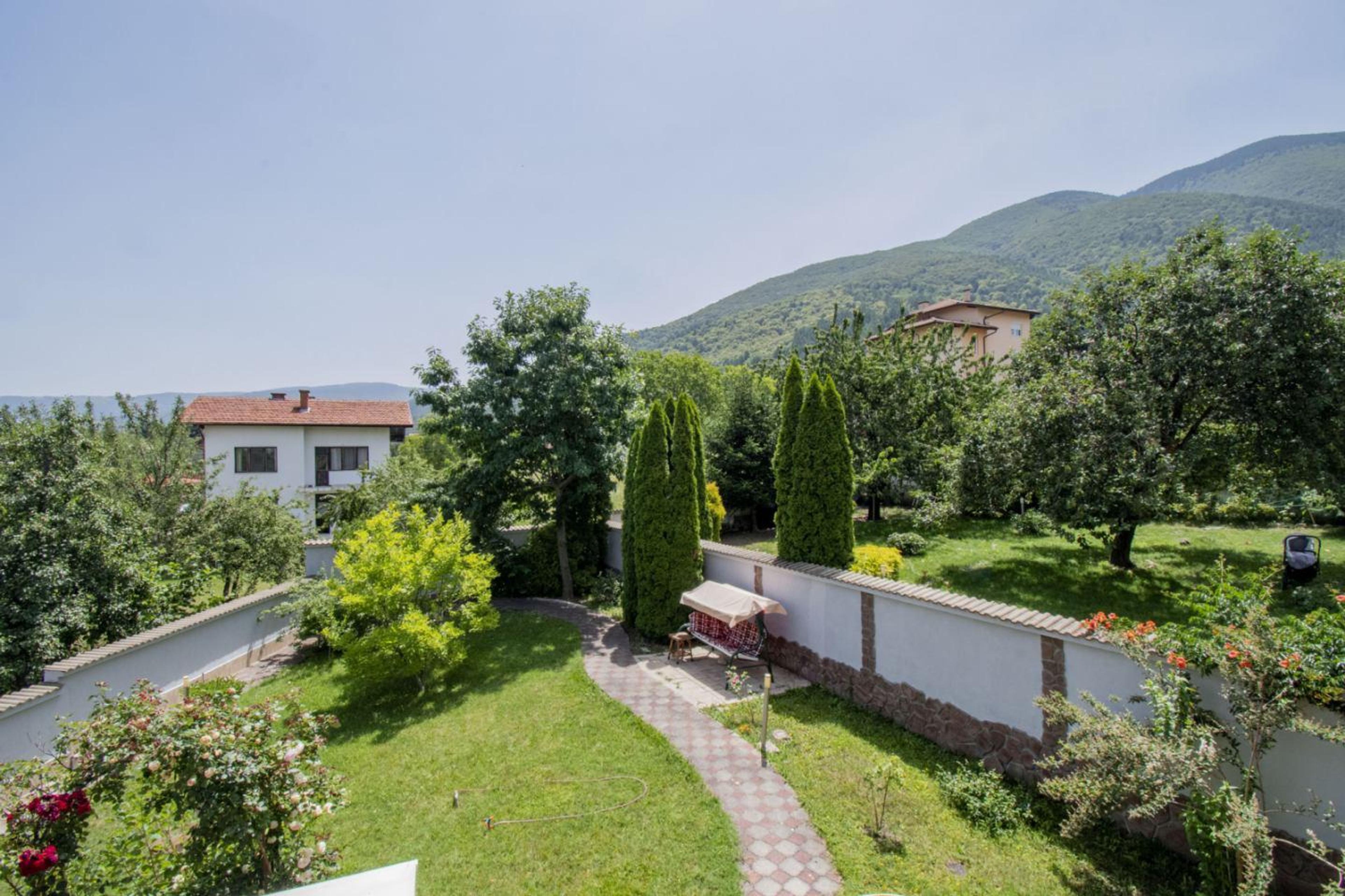 House with garden and mountain view in Sofia – peaceful property for sale in Bulgaria with large plot and greenery.