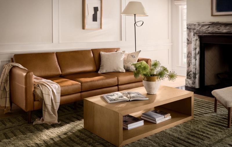 Nomad sofa in camel leather with an oak coffee table
