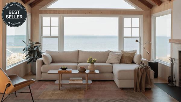 Best Seller: Span sleeper sofa sectional with reversible chaise in front of a big picture window