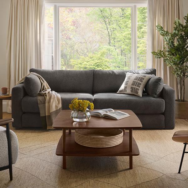 gray span sofa with coffee table