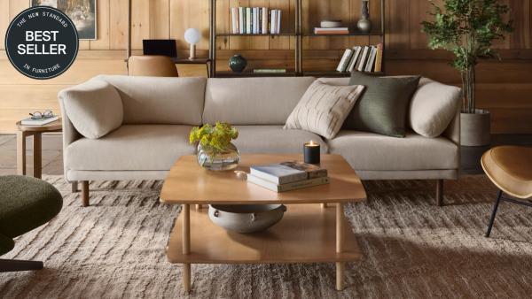 Best Seller: Range Sofa in Georgia Clay styled with moss green pillows in a living room