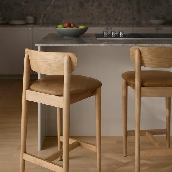 Haiku dining stools in camel and oak