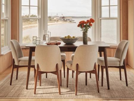 dining table with ivory and walnut chairs