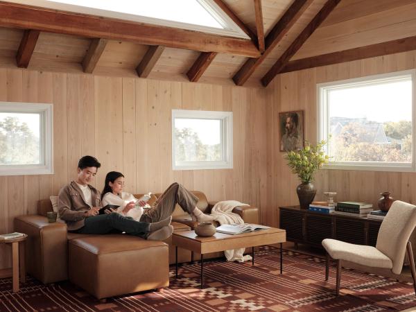 Couple sitting on sofa