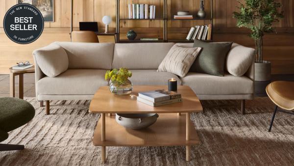 Best Seller: Range Sofa in Georgia Clay styled with moss green pillows in a living room