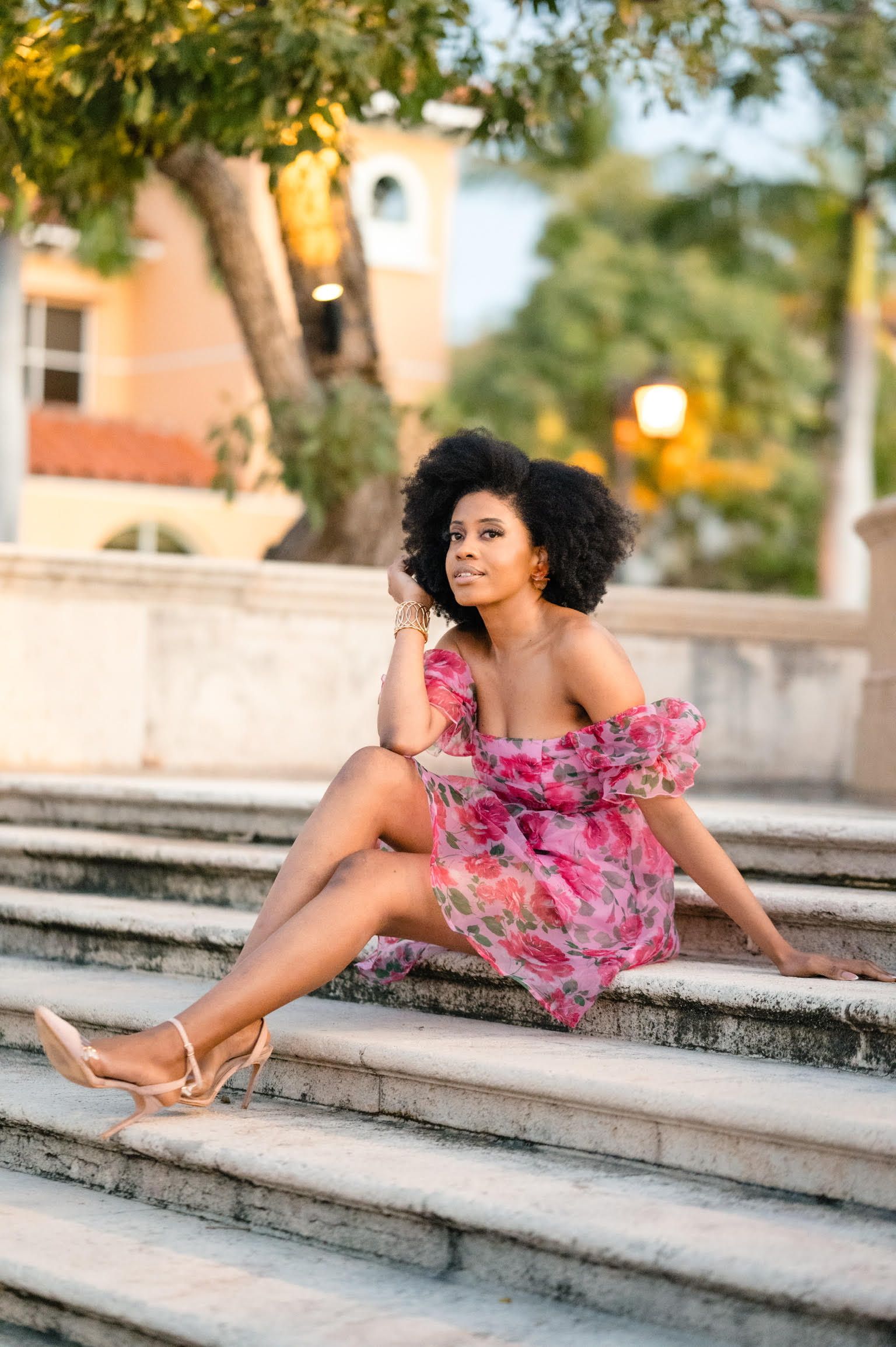 Ludnie Augustin in a pink dress