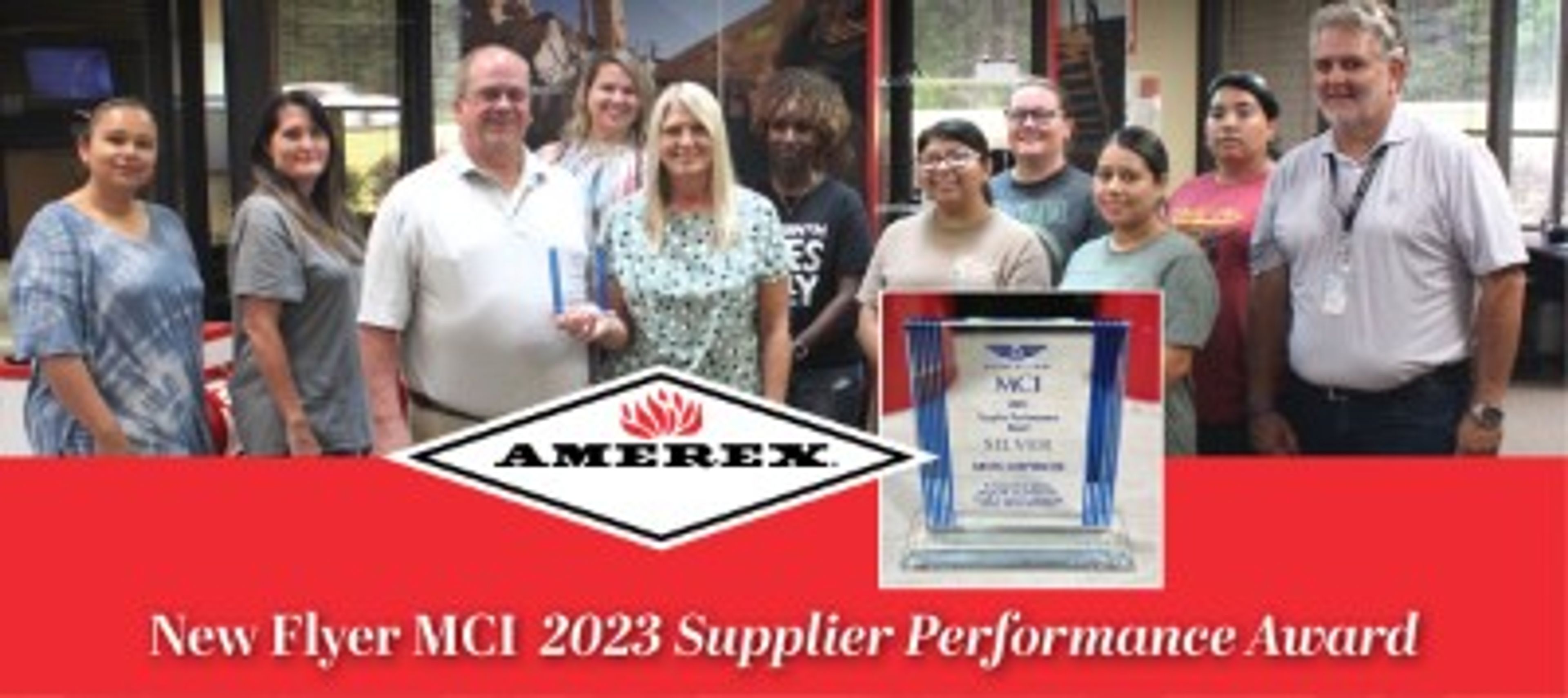 A group of people stands together indoors, smiling beside a trophy. The image includes the Amerex logo and text: “New Flyer MCI 2023 Supplier Performance Award.”.