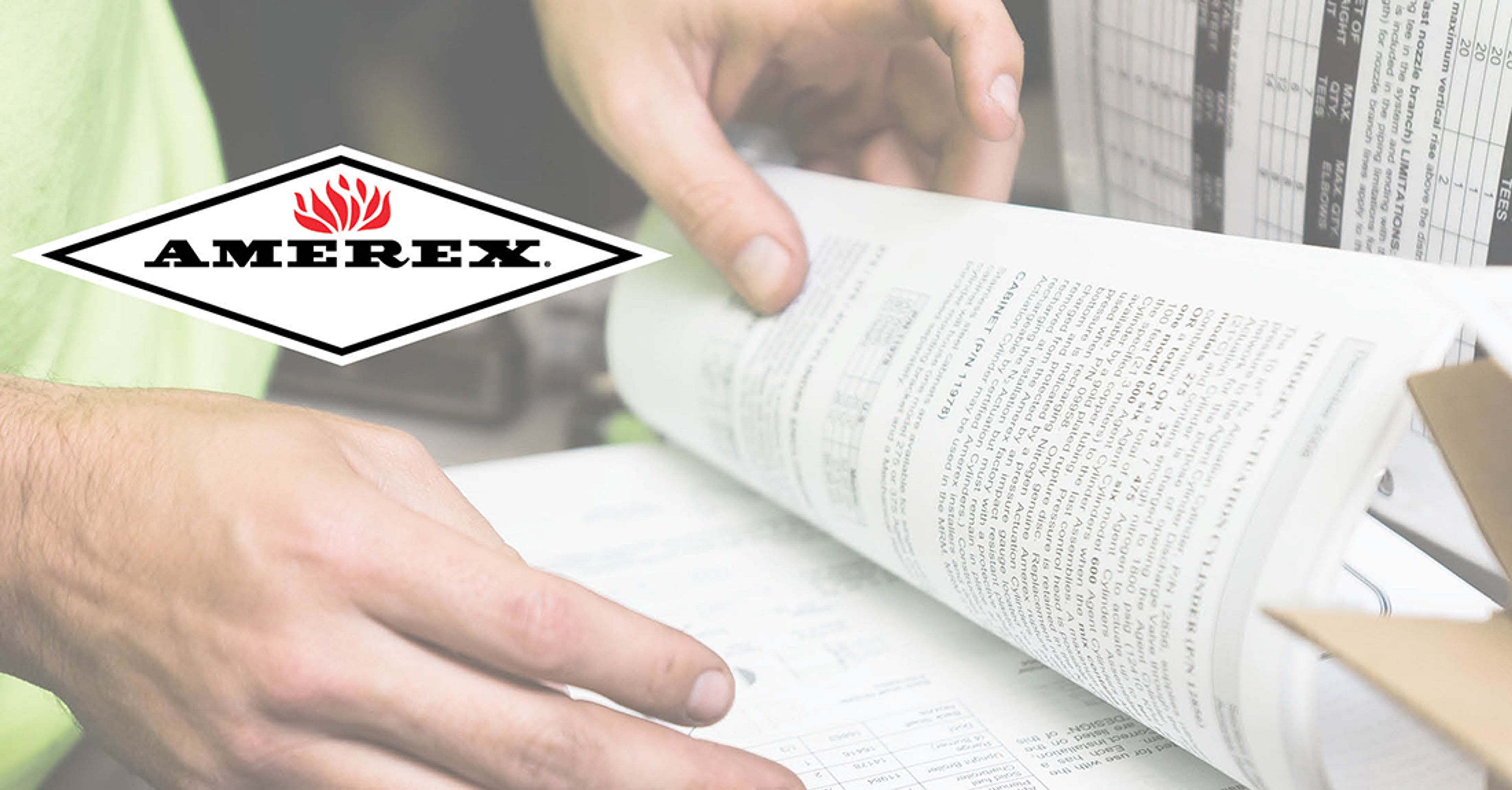 A person flips through a technical manual or catalogue, with an Amerex logo featuring red flames and black text on a white diamond shape displayed prominently to the left.
