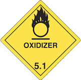 Yellow diamond hazard sign with a black flame over a circle, labeled “OXIDIZER” and “5.1,” indicating an oxidizing substance.