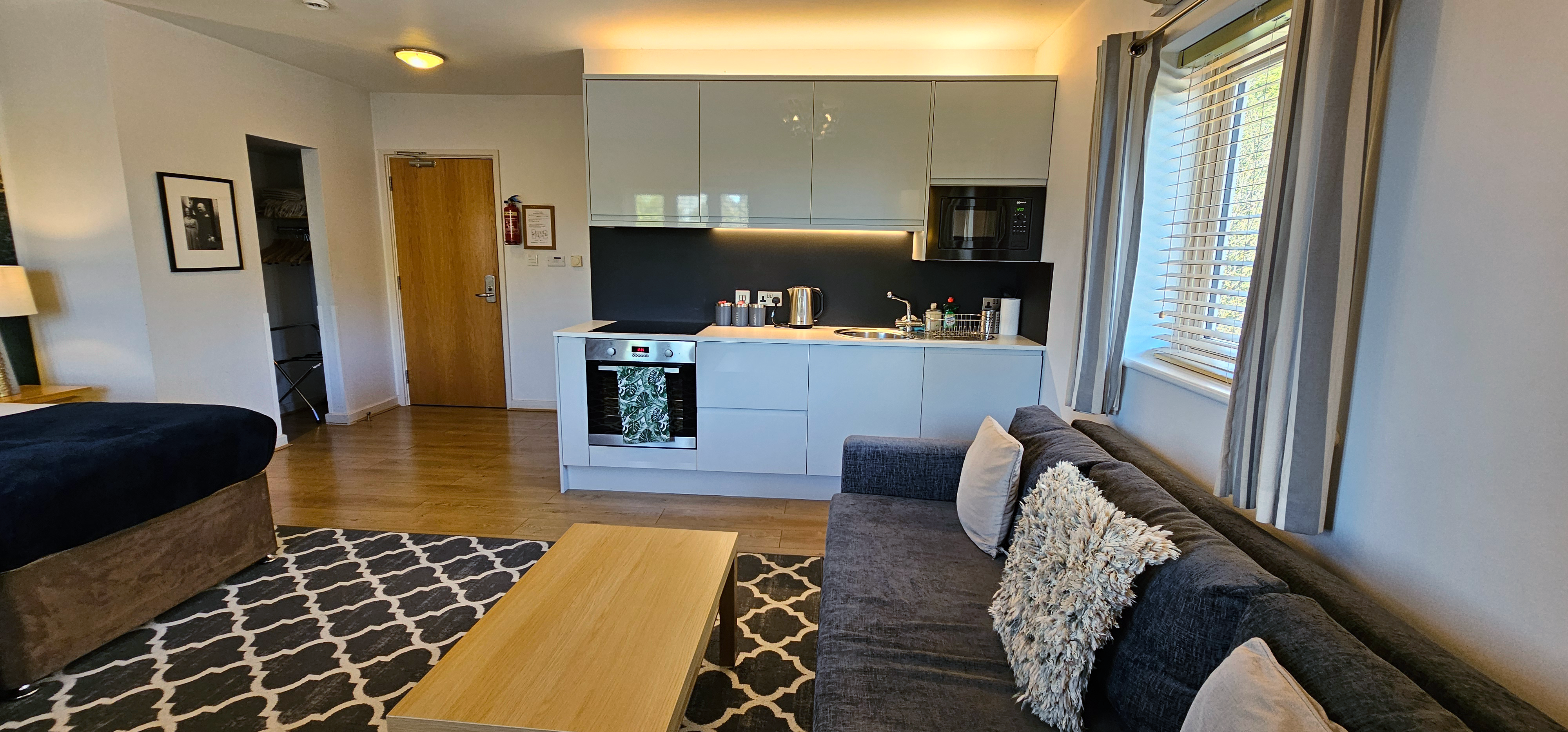 Twin Studio Suite with sofa, coffee table, kitchenette with oven, hobs & microwave
