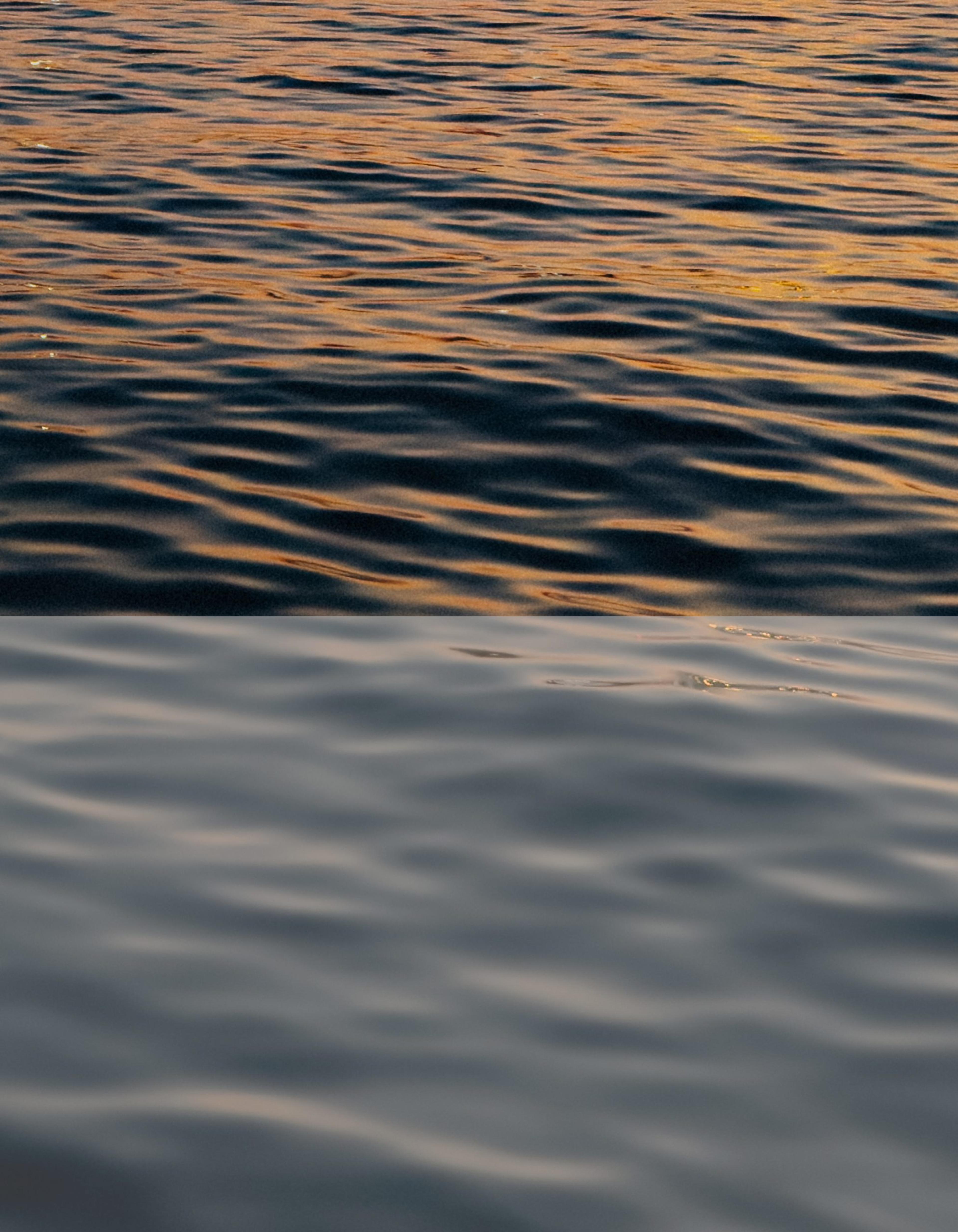 Split image comparing warm golden rippling water above flat, desaturated grey water below