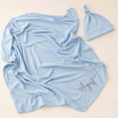 Personalized bamboo swaddle blanket with embroidered baby name