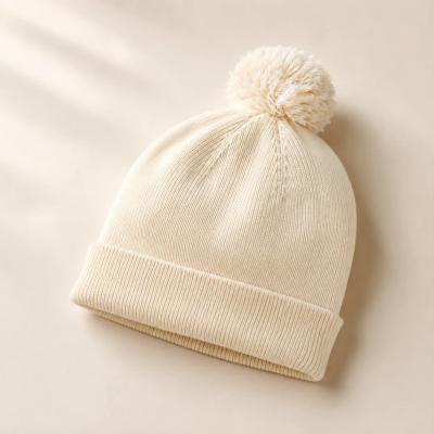 Cotton knit baby beanie with cable knit texture